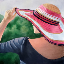Sun on a painting of a woman in a hat